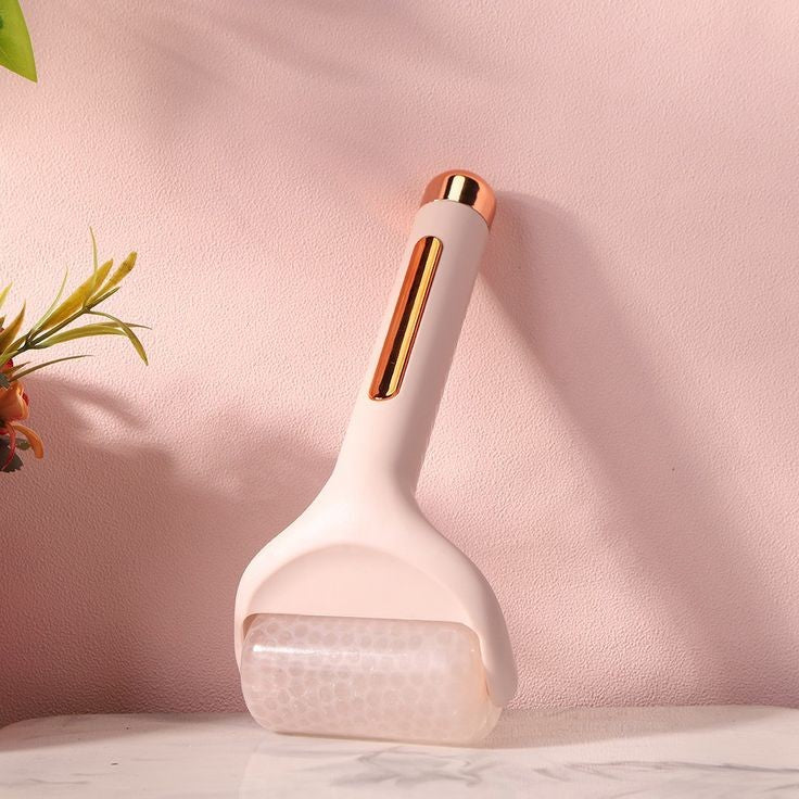 Ice roller massager with a cooling roller head and sleek handle for a sculpting and face lifting.