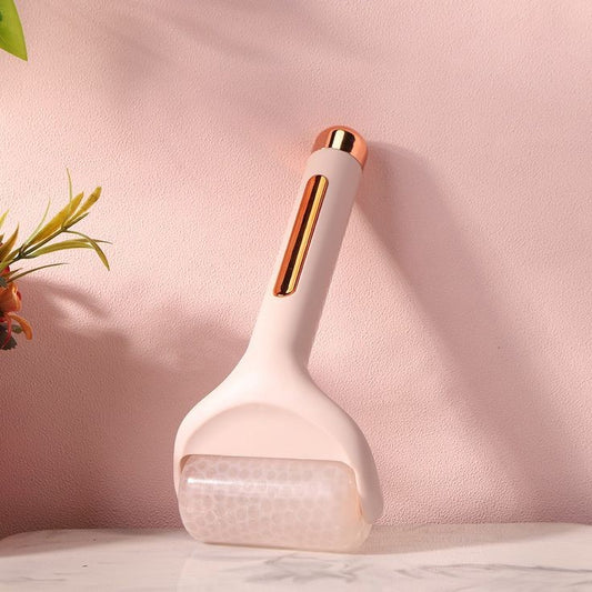 Ice roller massager with a cooling roller head and sleek handle for a sculpting and face lifting.