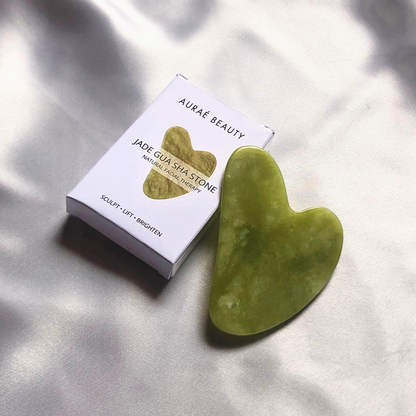 Pro jade gua sha stone by Aurae Beauty for contoured and sculpted face