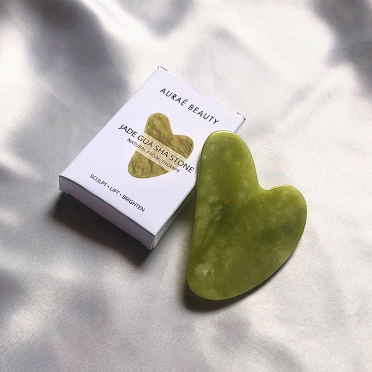 Pro jade gua sha stone by Aurae Beauty for contoured and sculpted face