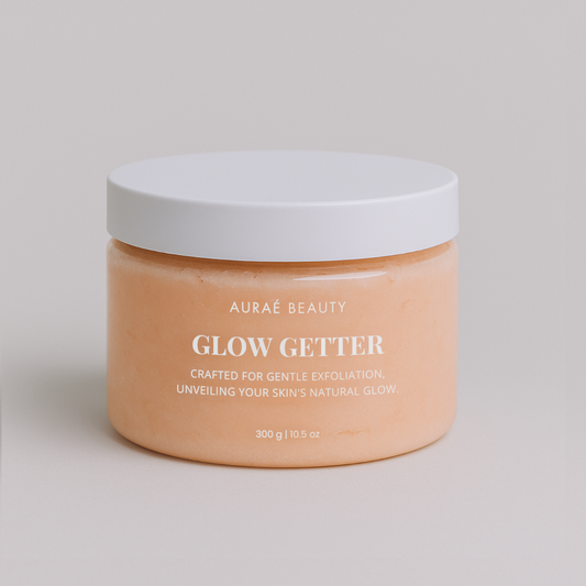 Jar of Glow Getter Body Scrub by Auraé Beauty for soft, smooth skin and natural glow