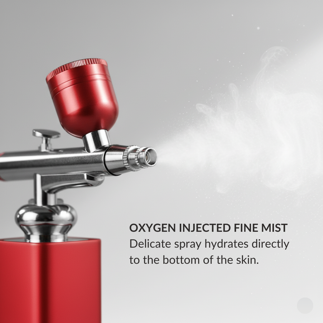 Red and silver oxygen injected fine mist device on a gray background