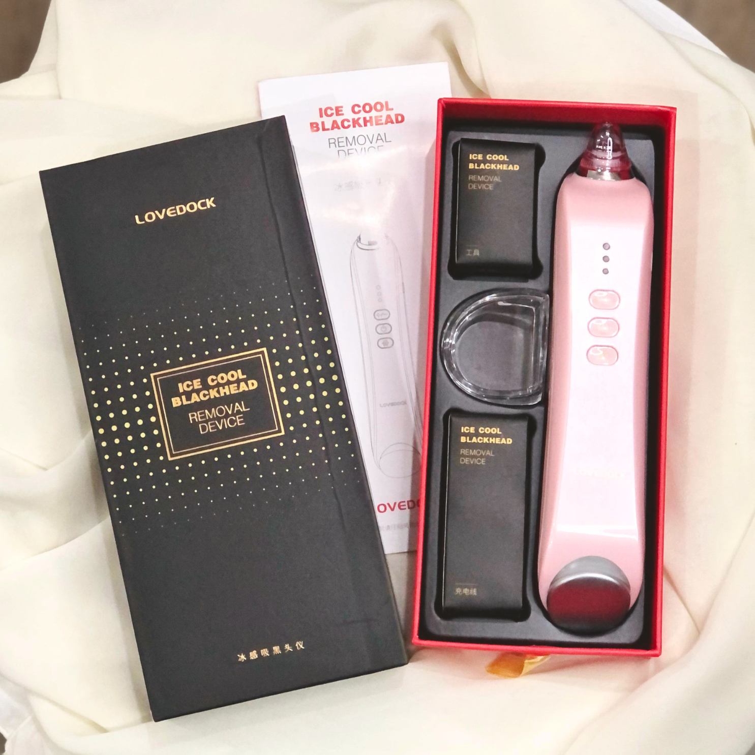 image of the opened box of 5 in 1 Electric face lifting and blackhead removal device by Auraé Beauty